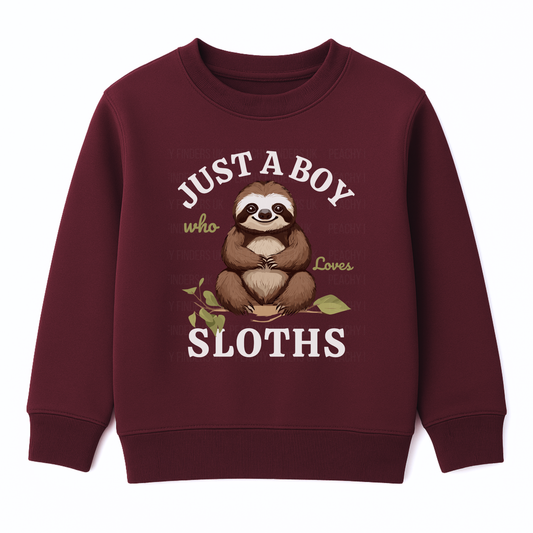 Burgundy boys sweatshirt with the words “Just A Boy Who Loves Sloths” and a cute brown sloth sitting on a leafy branch printed on the front, kids sloth jumper ages 3–13.