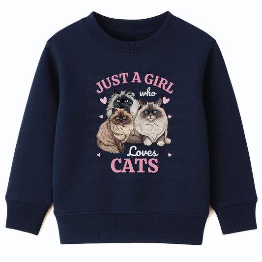 Kids navy sweatshirt printed with three fluffy Ragdoll and Persian cats, pink hearts and the text ‘Just a Girl Who Loves Cats’