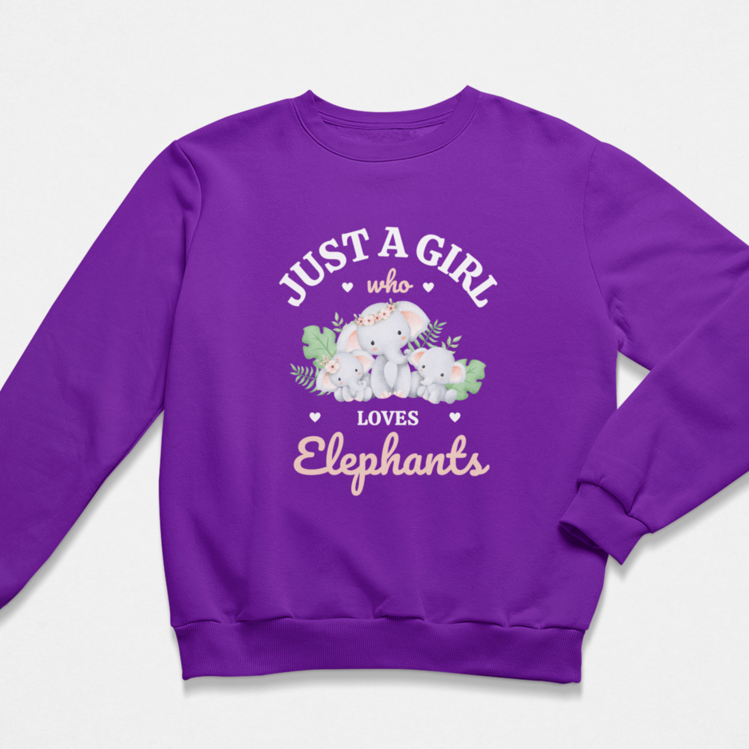 Purple girls sweatshirt with “Just a Girl Who Loves Elephants” text and cute elephant family design.