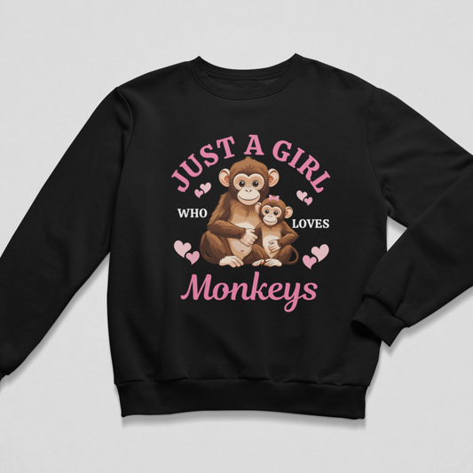 Girls black sweatshirt with 'Just a girls who loves monkeys' printed mum and baby monkeys with pink hearts graphic.