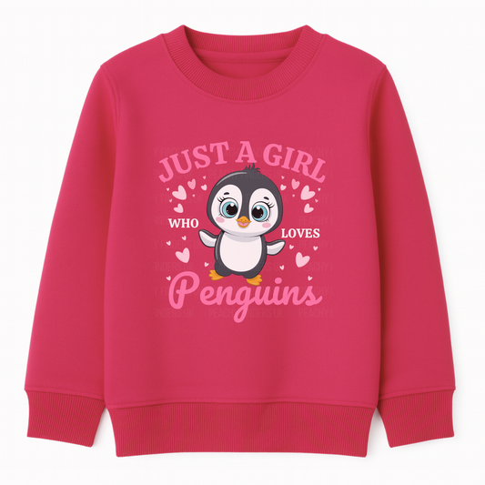 Girls hot pink sweatshirt featuring a cute cartoon penguin and hearts design with pink and white text saying “Just a Girl Who Loves Penguins”.