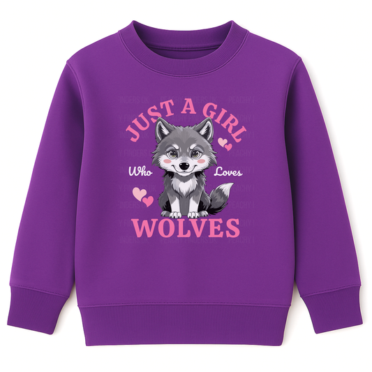 Purple girls sweatshirt with ‘Just A Girl Who Loves Wolves’ slogan and cute grey wolf pup with pink hearts – kids wolf jumper ages 3–13.