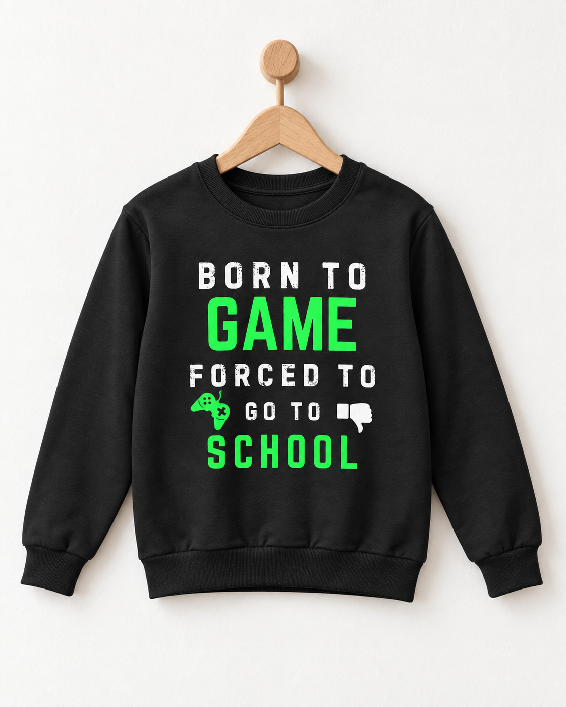 Kids Born to Game Forced to Go to School black crewneck sweatshirt hanging from a wooden wall hook.