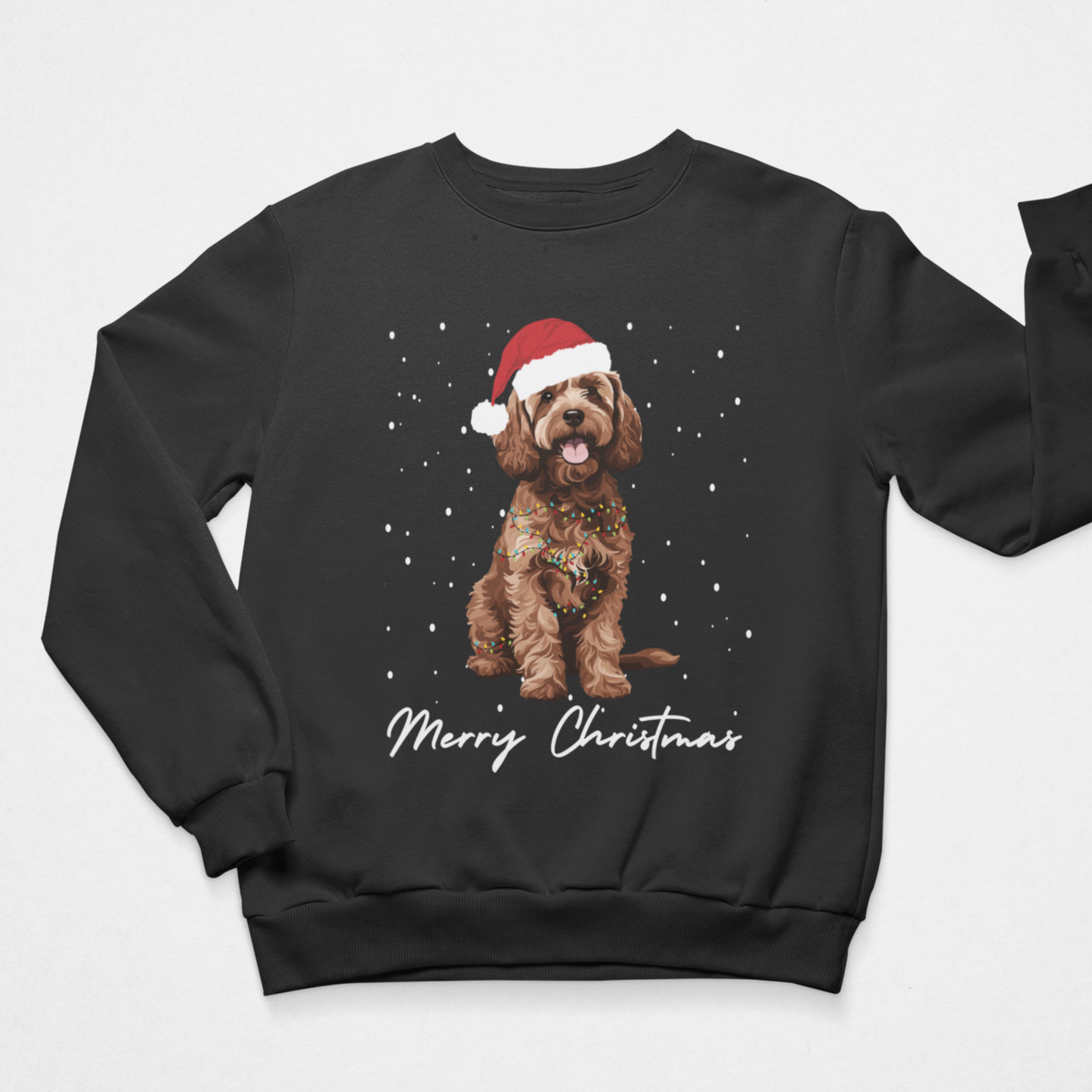 A black crewneck sweatshirt for kids featuring a graphic of a brown cockapoo  wearing a red Santa hat, surrounded by white snowflakes, with 'Merry Christmas' written in white script below. The sweatshirt is displayed flat against a light grey background.