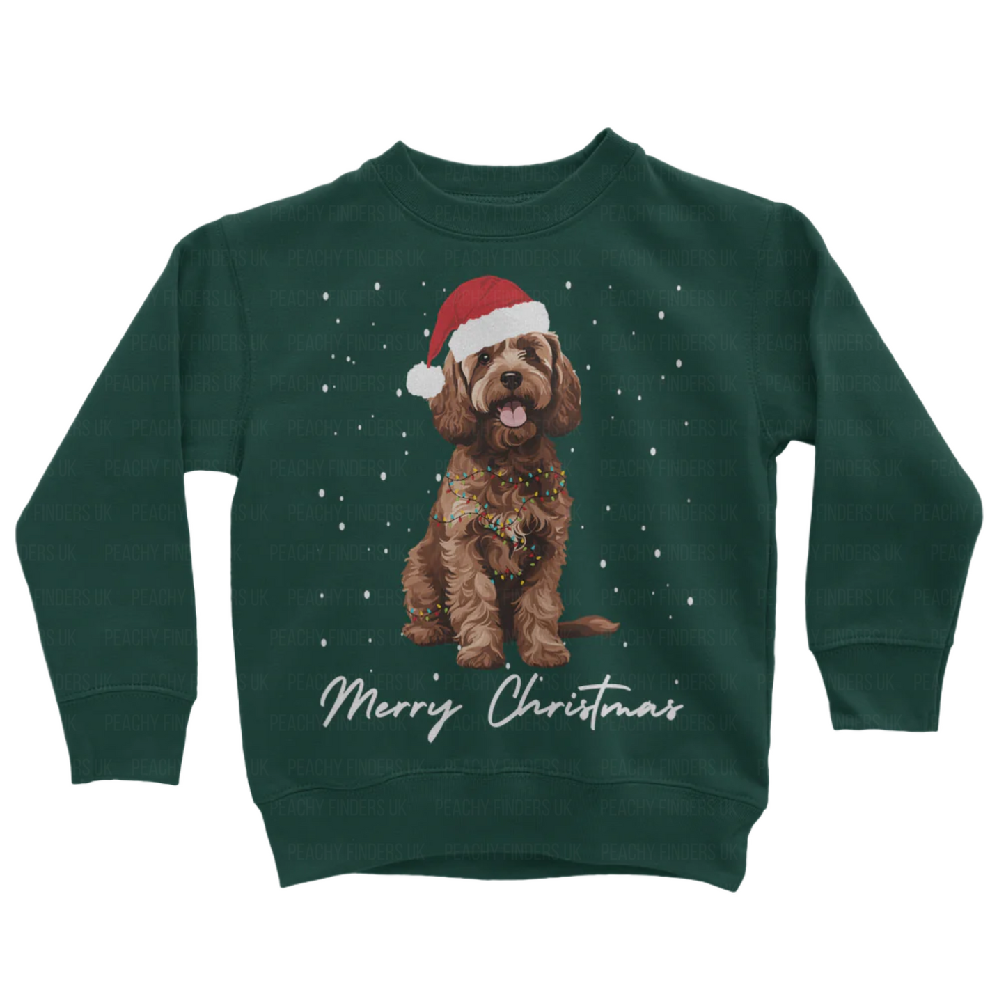 Kids dark green sweatshirt with a Christmas-themed design of a brown cockapoo wearing a Santa hat, wrapped in fairy lights with falling snow and the text 'Merry Christmas'.