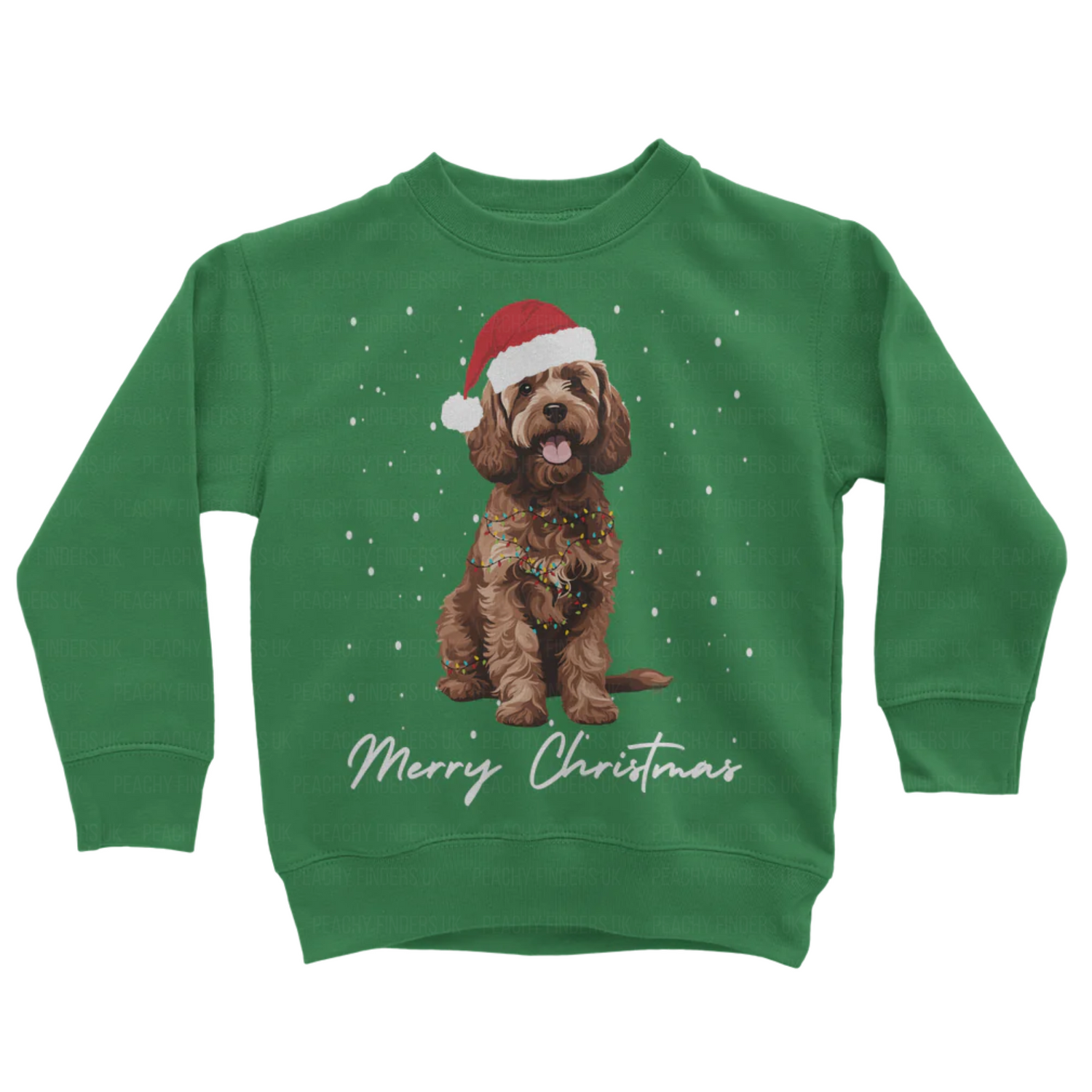 Kids green sweatshirt with a Christmas-themed design of a brown cockapoo wearing a Santa hat, wrapped in fairy lights with falling snow and the text 'Merry Christmas'.