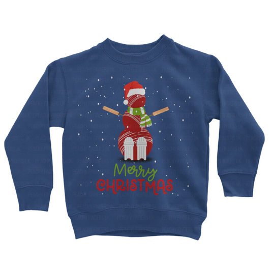 Kids royal blue sweatshirt with a Christmas-themed cricket ball snowman and 'Merry Christmas' text on a white background.