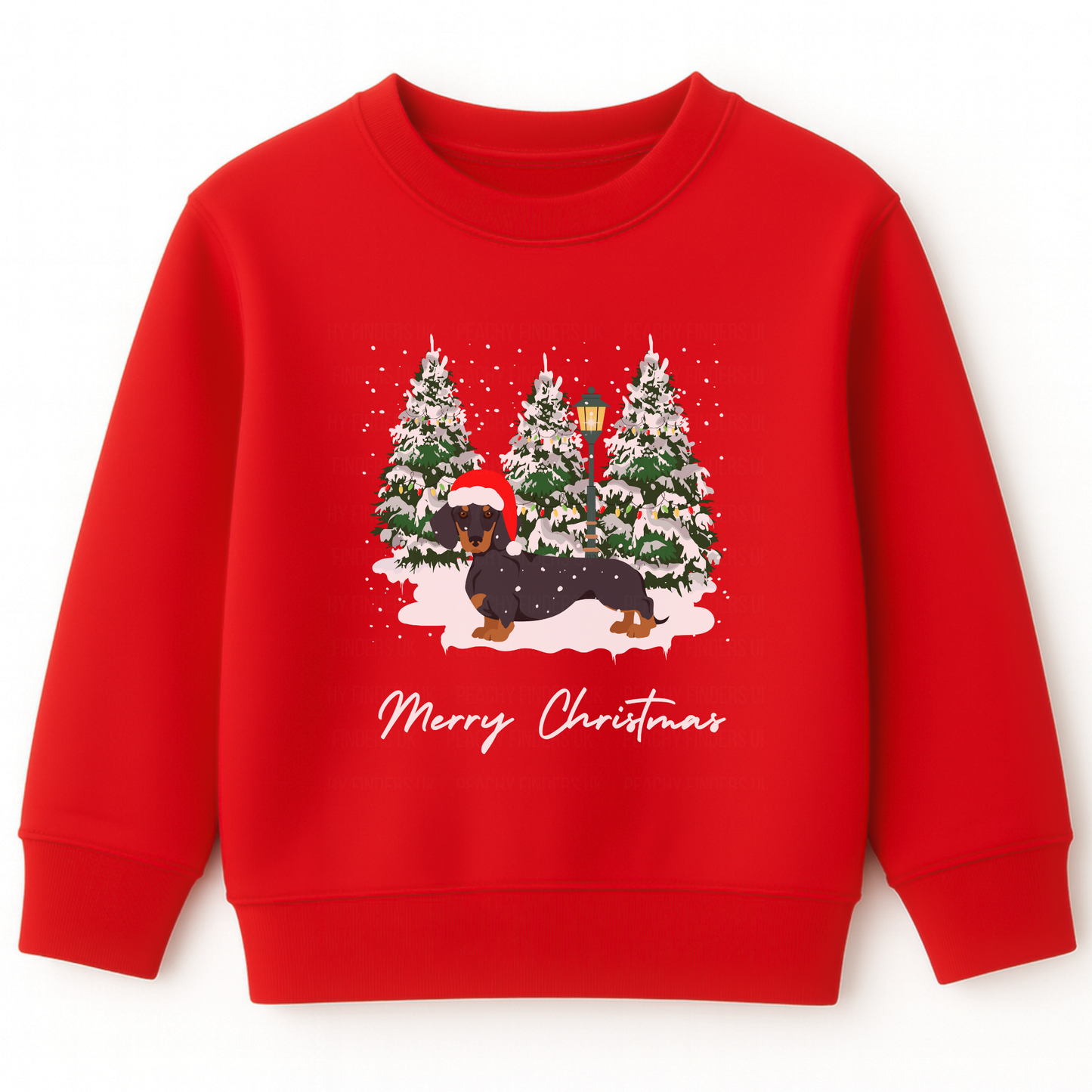Kids red Christmas sweatshirt featuring a festive dachshund in a Santa hat, surrounded by snowy Christmas trees.