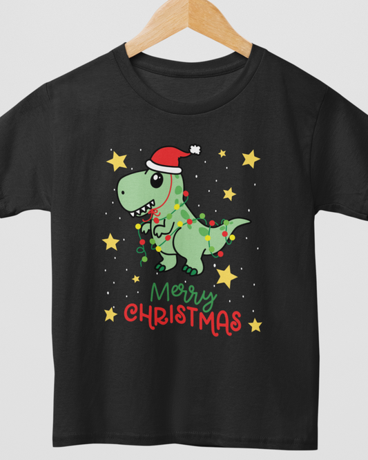 Kids Christmas t-shirt in black featuring cute dinosaur in Santa hat wrapped in festive lights with stars and “Merry Christmas” text