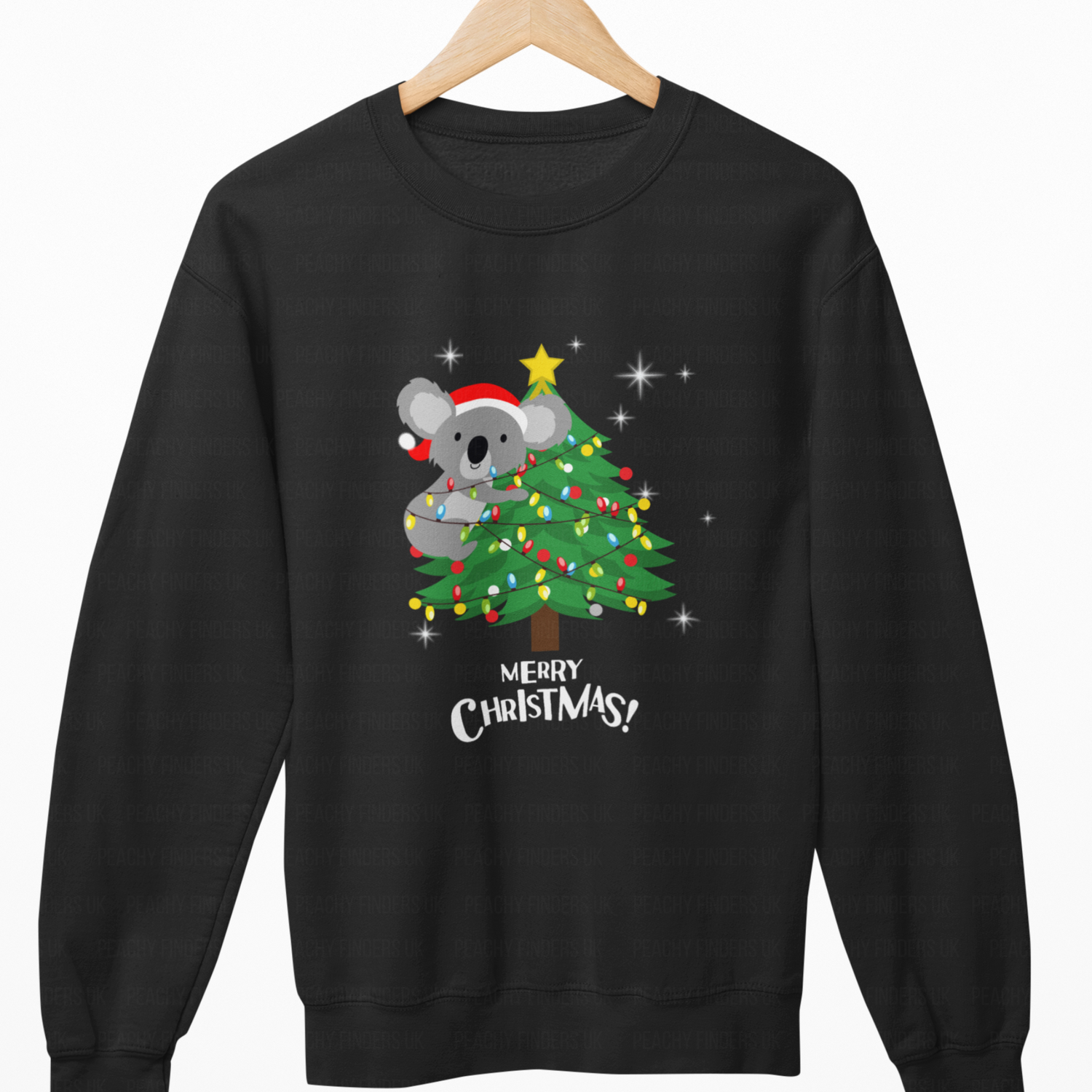 Black sweatshirt with a Christmas design of a koala on a tree, featuring 'Merry Christmas!' text.