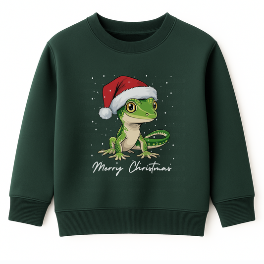 Dark green kids Christmas jumper featuring a cute gecko wearing a Santa hat with ‘Merry Christmas’ text and snow details