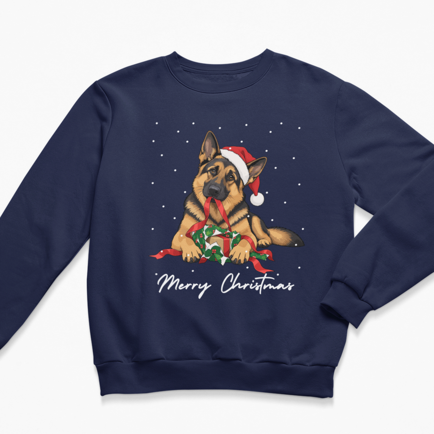 Flat lay product shot of navy blue kids Christmas sweatshirt showing a German Shepherd with a Santa hat and a wrapped holiday gift under white 'Merry Christmas' lettering