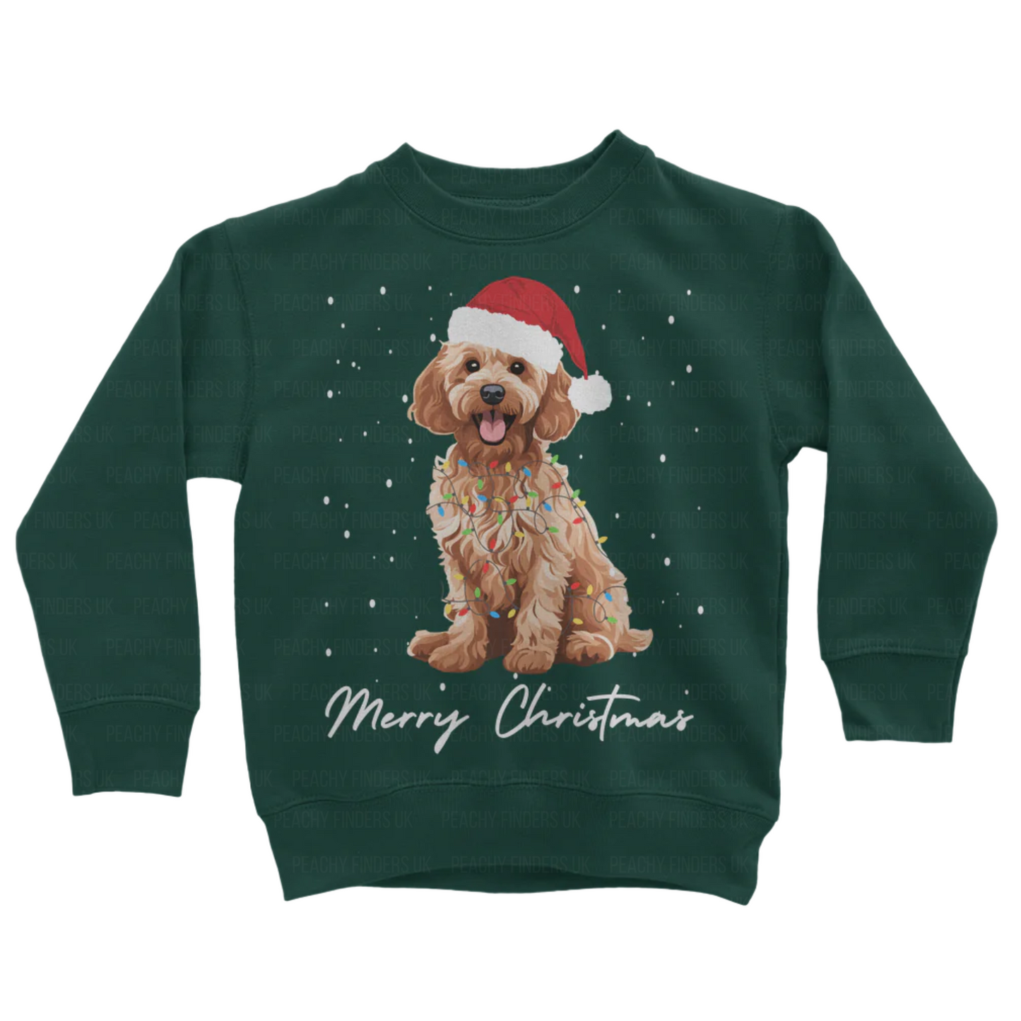 Kids dark green sweatshirt with a Christmas-themed design of a golden cockapoo wearing a Santa hat, wrapped in fairy lights with falling snow and the text 'Merry Christmas'.