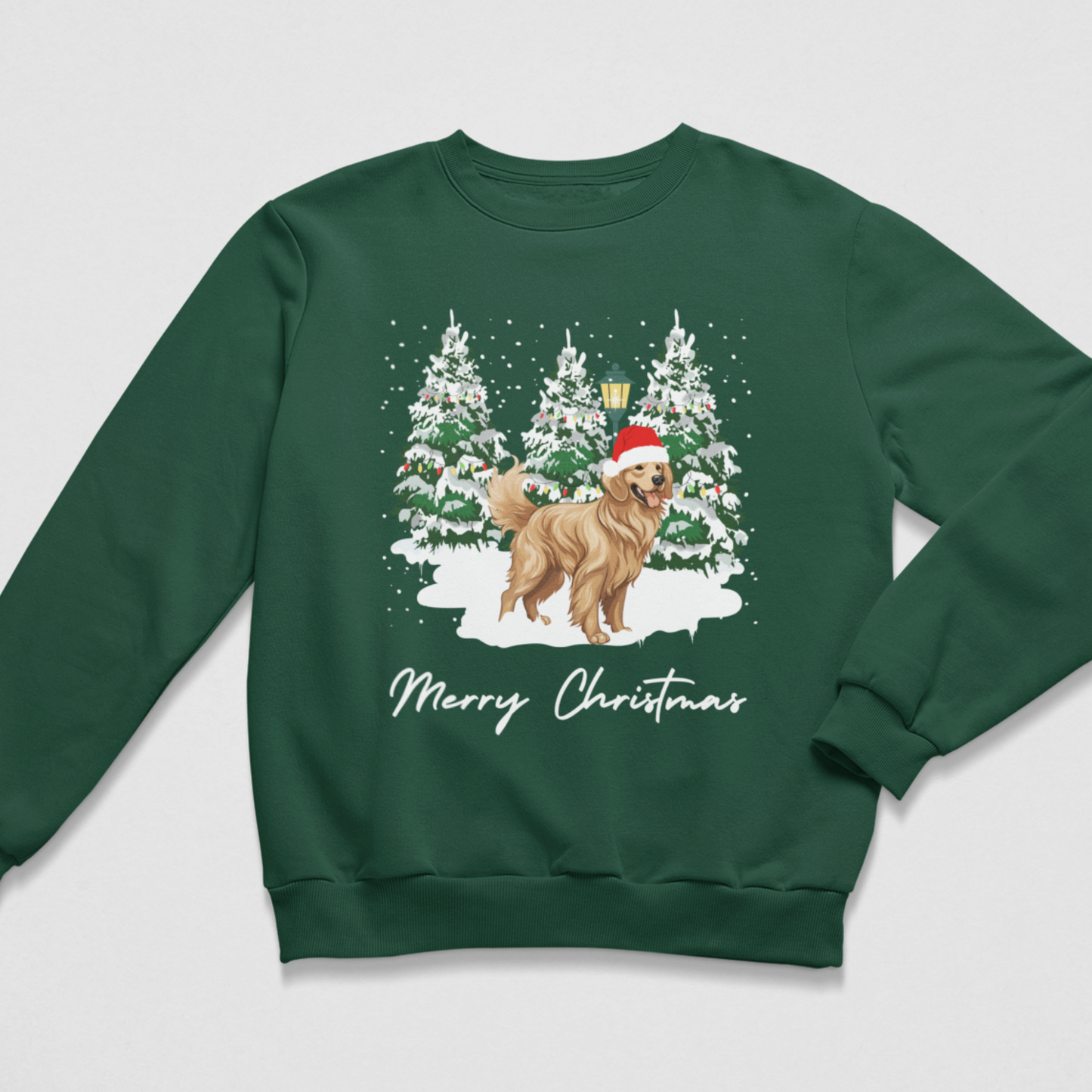 A kids dark green crewneck sweatshirt featuring a festive Christmas graphic of a golden retriever dog wearing a Santa hat, standing in front of snow-covered pine trees with the text 'Merry Christmas' written below.