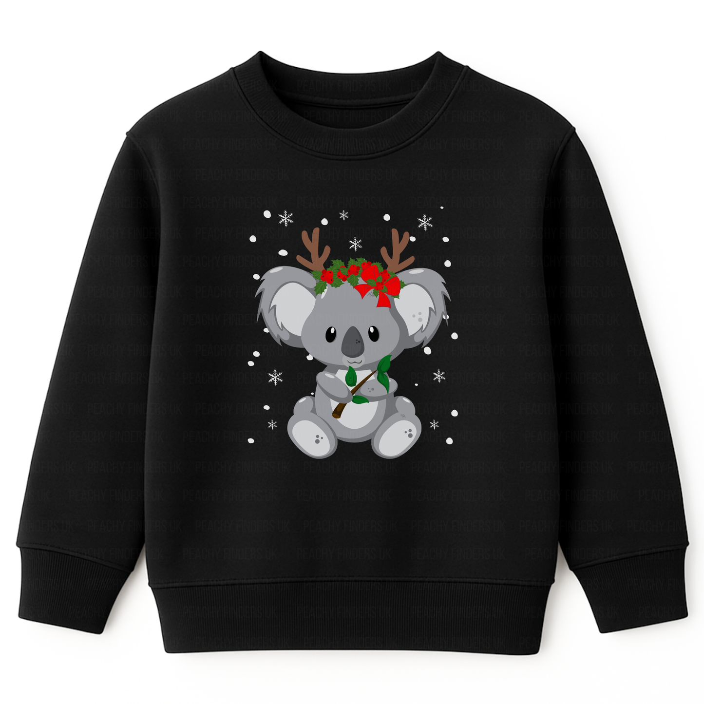 Kids black Christmas sweatshirt featuring a cute koala wearing reindeer antlers and holly, surrounded by snowflakes, printed on the front. 