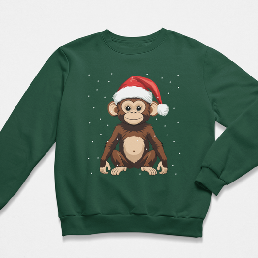 Dark green kids Christmas sweatshirt flat lay with cute monkey wearing a Santa hat and falling snow graphic