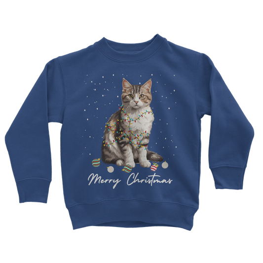 Kids blue sweatshirt featuring a festive cat wrapped in fairy lights with falling snow and the text 'Merry Christmas'.