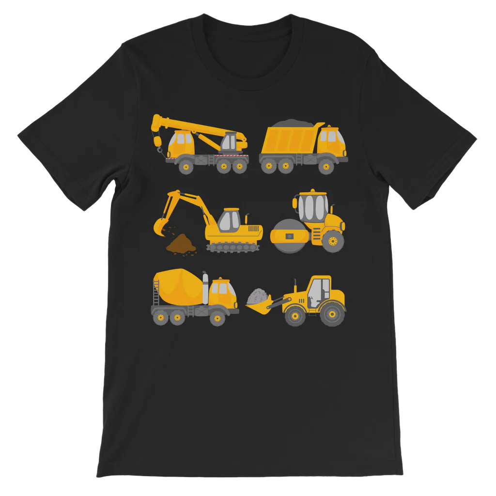 A kids black t-shirt displays a grid of six yellow construction vehicle illustrations. The vehicles shown are, from top left to bottom right: a mobile crane, a dump truck, an excavator digging into a pile of brown soil, a road roller, a cement mixer truck, and a front-end loader scooping up grey material.