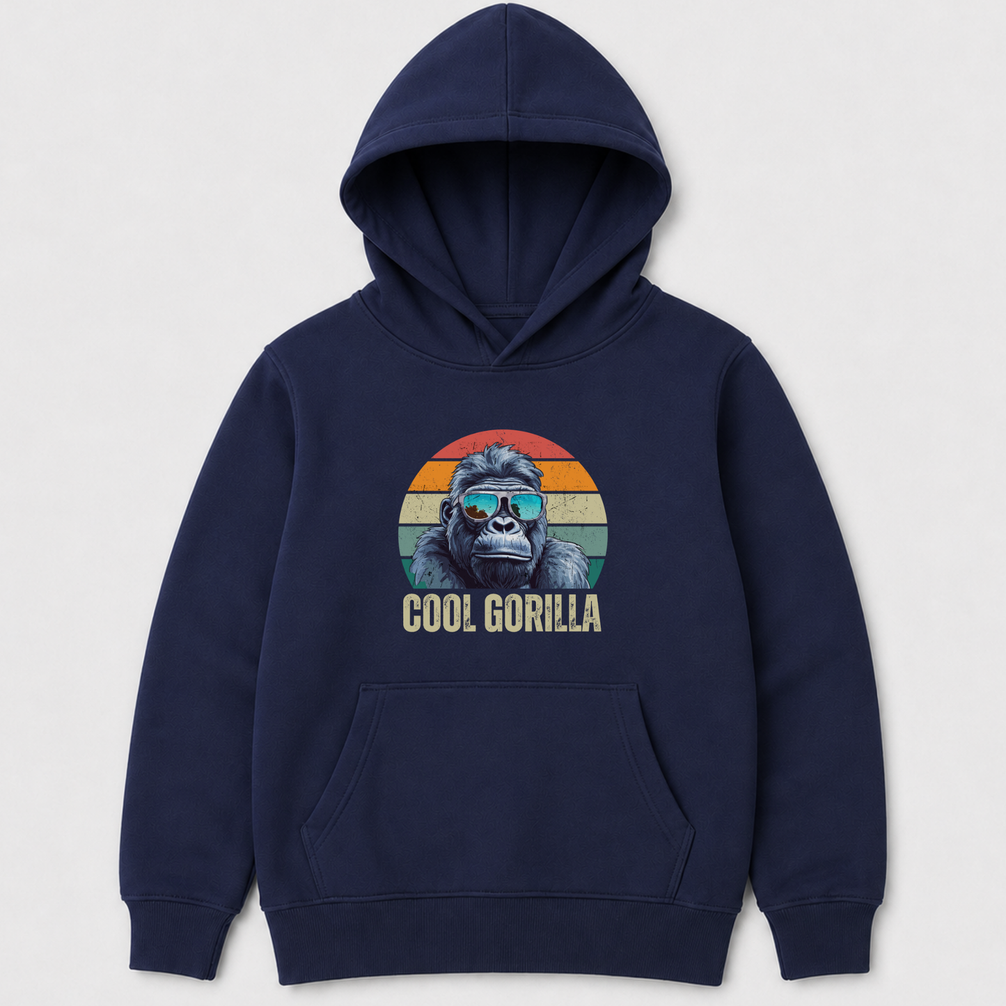 A kids navy pullover hoodie with a front kangaroo pocket and a graphic of a gorilla wearing sunglasses inside a retro sunset circle, with the text 'COOL GORILLA' below, shown on a light grey background.