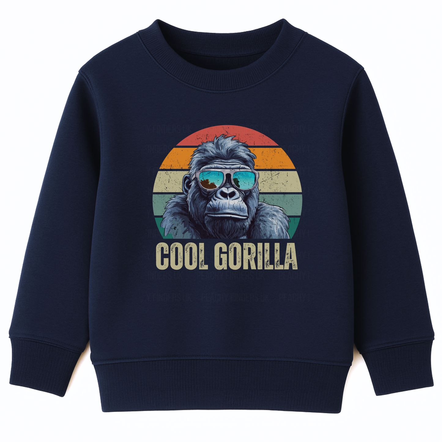 Kids navy sweatshirt featuring a circular graphic of a cool gorilla wearing blue reflective sunglasses. The background is a retro sunset with orange, yellow, and green stripes. Below the gorilla, the text 'COOL GORILLA' is printed."