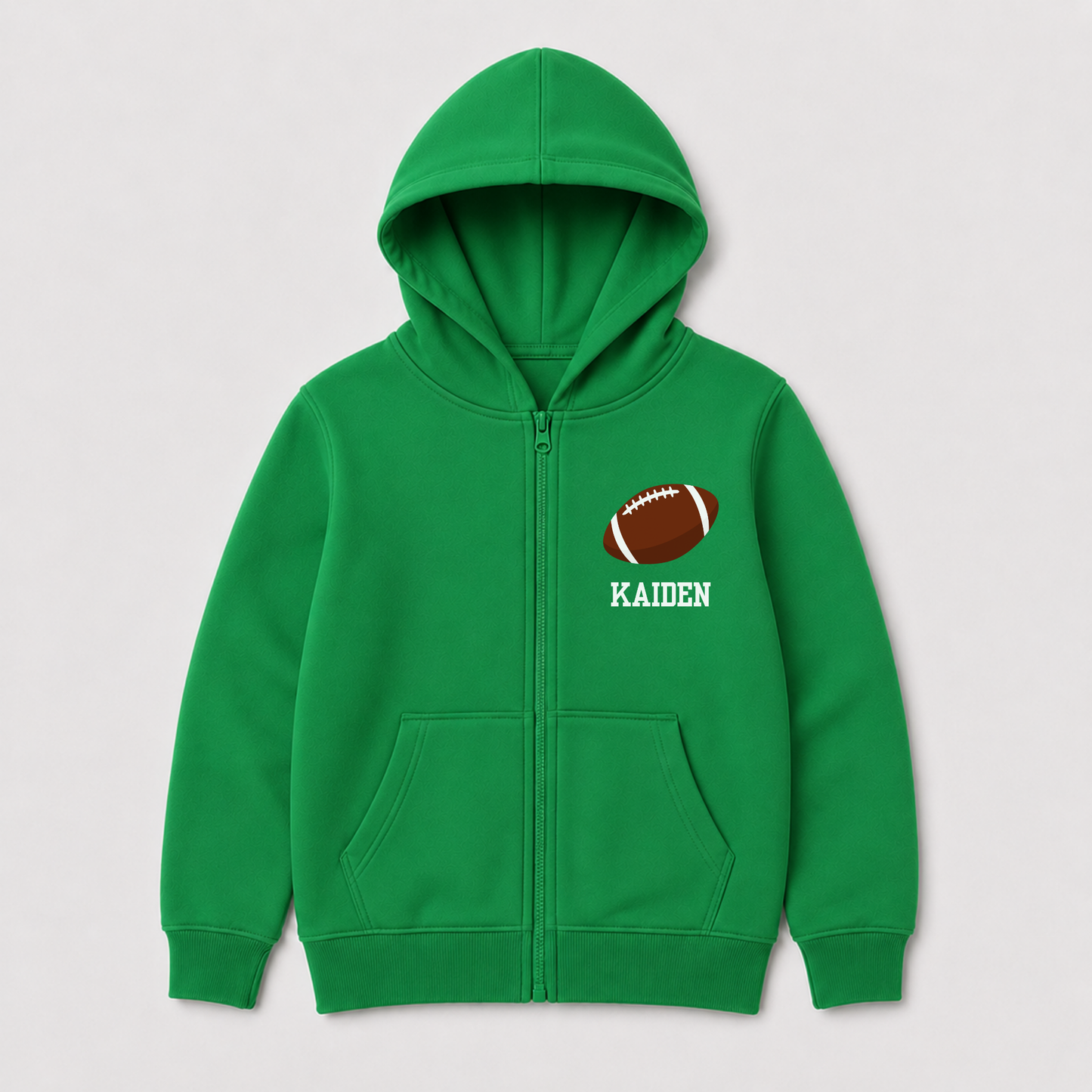 Green children’s custom name American football zip hoodie featuring a football motif on the chest and personalised name underneath.