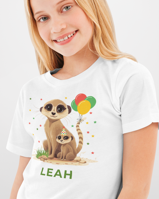 Girl wearing a white kids t-shirt with personalised birthday meerkat design and custom name