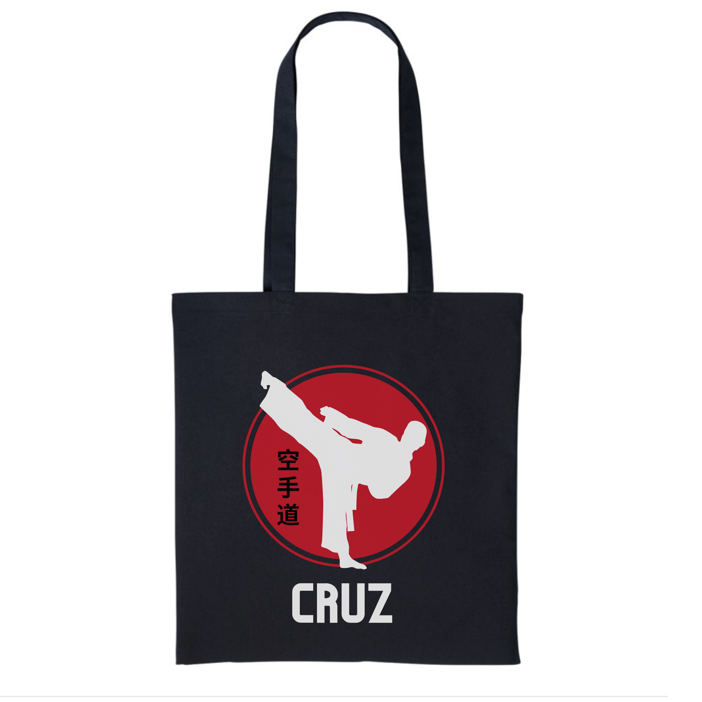 Kids black personalised karate tote bag with white high-kick silhouette, red circle emblem and name Cruz printed underneath