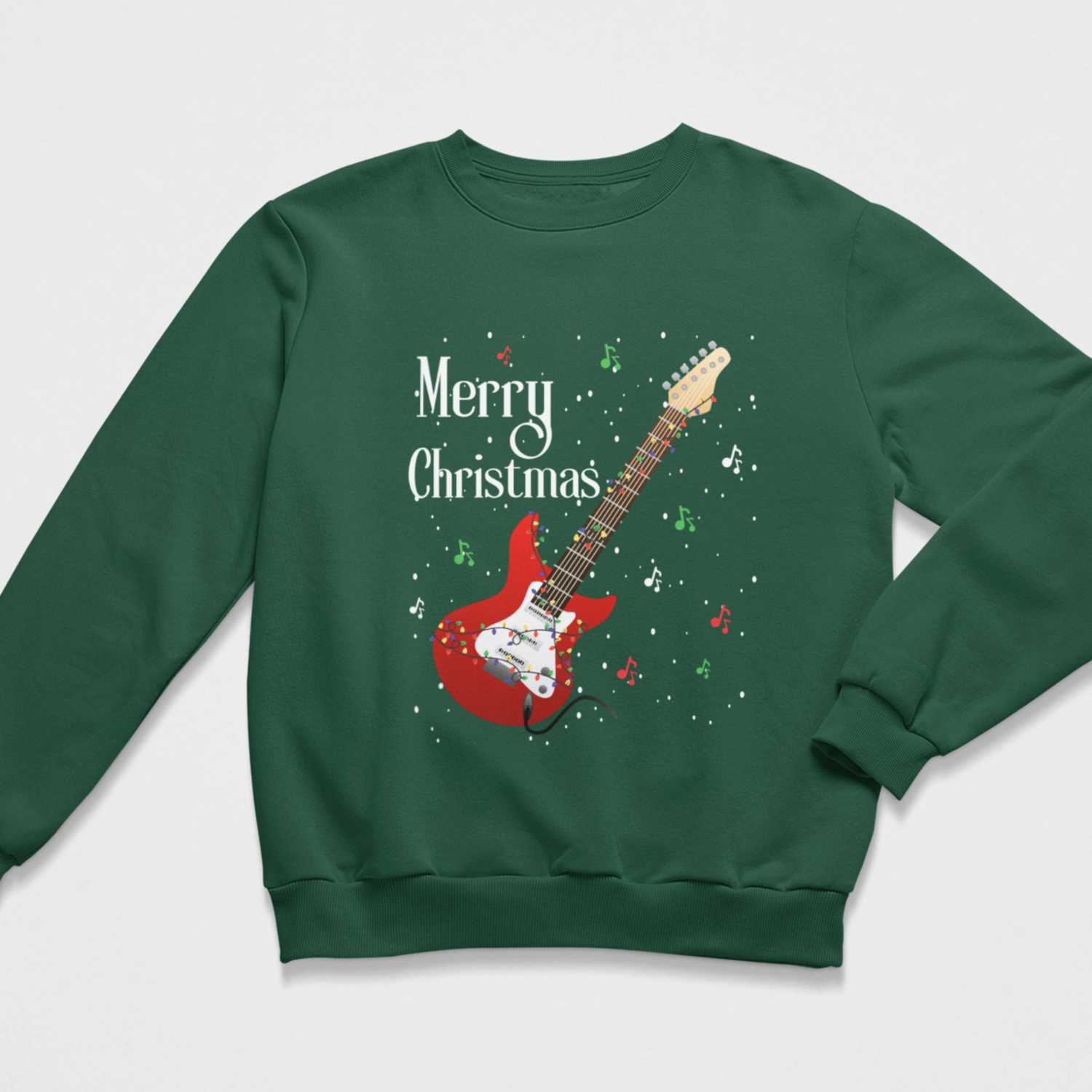 Dark-green kids’ Christmas jumper featuring a red electric guitar, festive lights, musical notes and Merry Christmas wording.