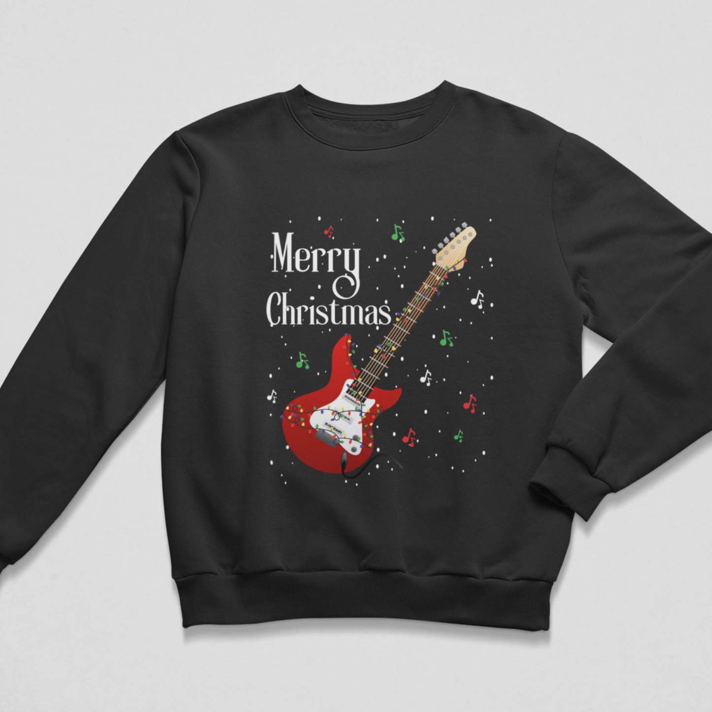 Black crewneck kids’ festive jumper featuring a red electric guitar, colourful Christmas lights, musical notes and falling snow.