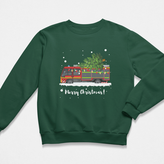 Green sweatshirt with a Christmas-themed design of a fire truck carrying a tree and 'Merry Christmas!' text on a white background.