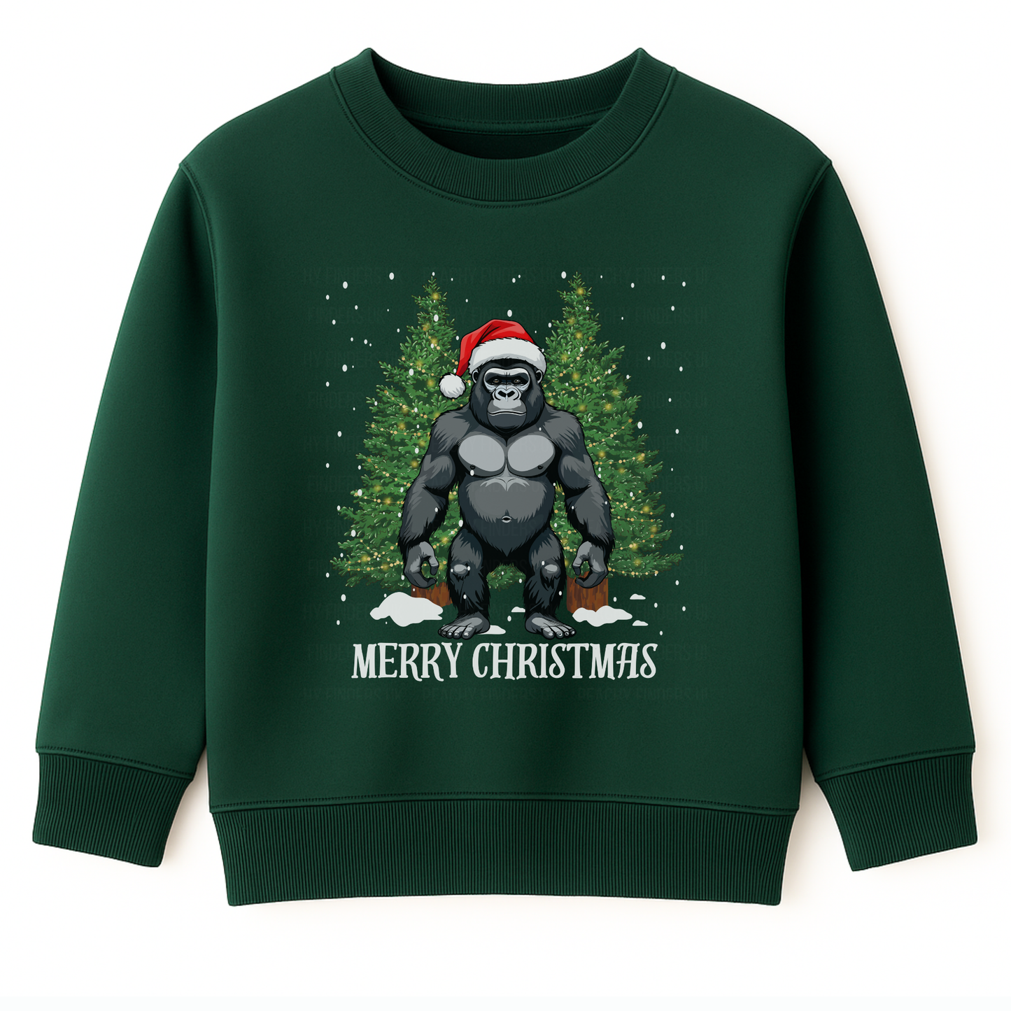 Kids dark green sweatshirt featuring a gorilla wearing a Santa hat, standing in front of two green Christmas trees decorated with lights. The text 'Merry Christmas' is below, with white snowflakes falling