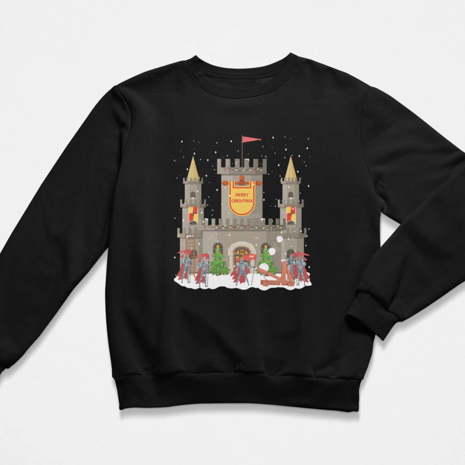 Kids black Christmas sweatshirt showing a snowy stone castle with “Merry Christmas” banner, golden turrets, red-armoured knights, catapult and festive trees on the front.
