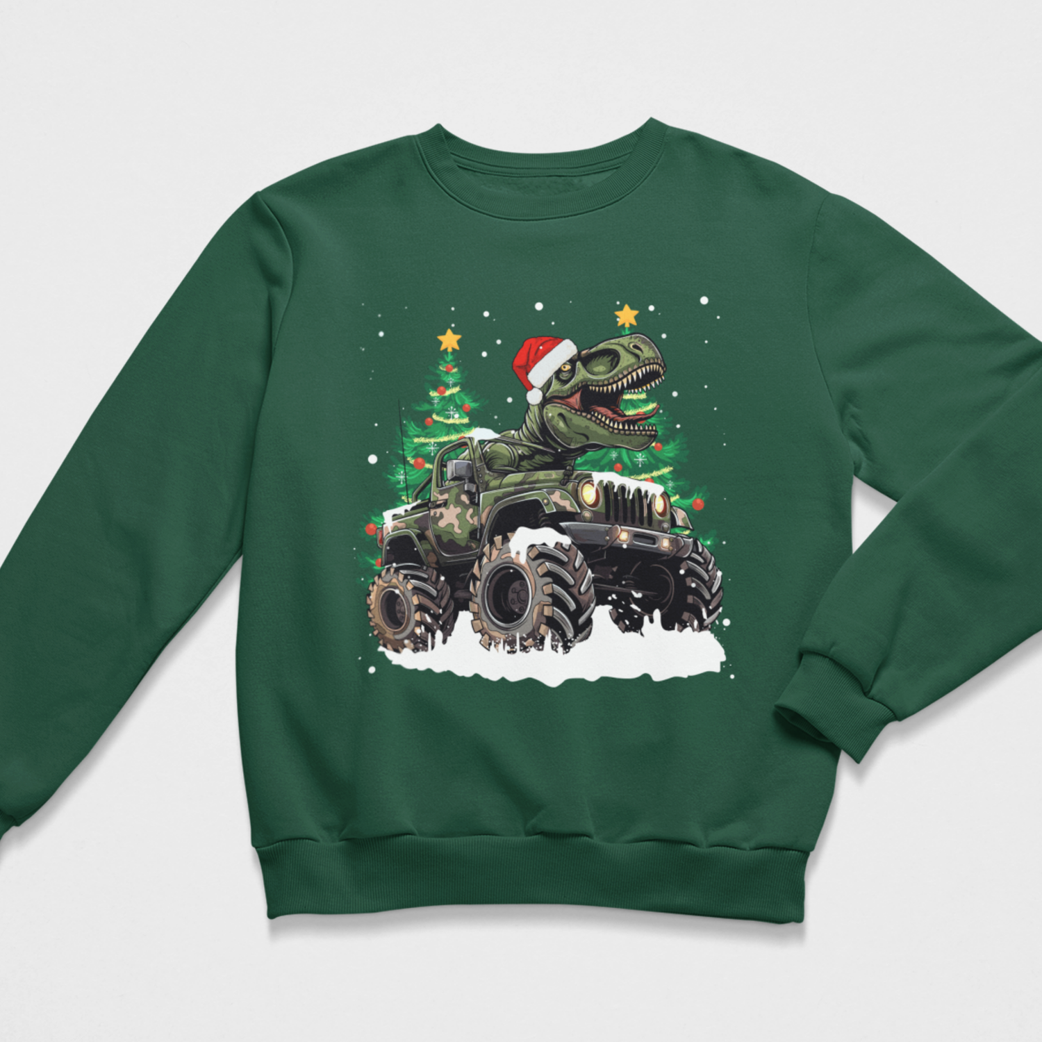 Bottle green children’s Christmas jumper showing a T-Rex riding in an off-road monster truck with snowy ground, festive trees and a Santa hat.