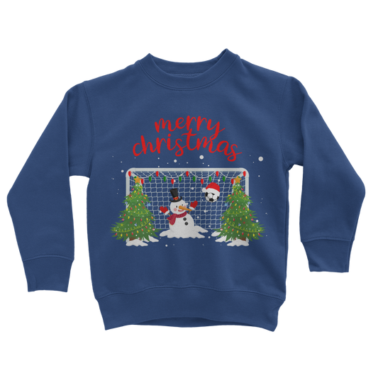 Royal blue kids Christmas sweatshirt with snowman goalkeeper design, festive goalpost, Christmas trees, and “Merry Christmas” text.