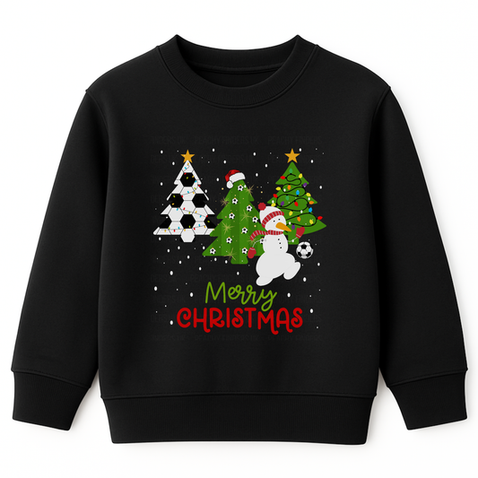 Kids black Christmas sweatshirt with football-themed xmas trees, a snowman in a Santa hat playing with a football, falling snow, and “Merry Christmas” text in red and green.