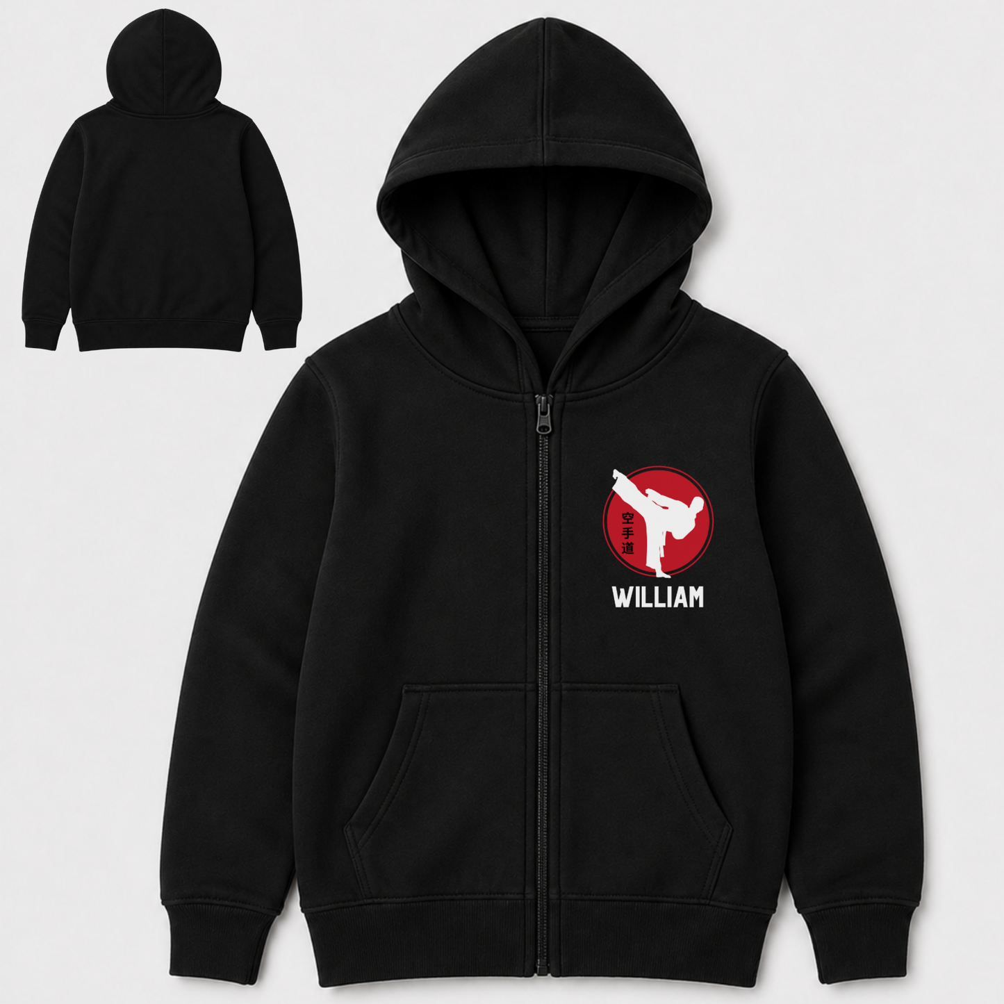 Kids black personalised karate zip hoodie with small red and white martial arts chest graphic and custom name William on the front.