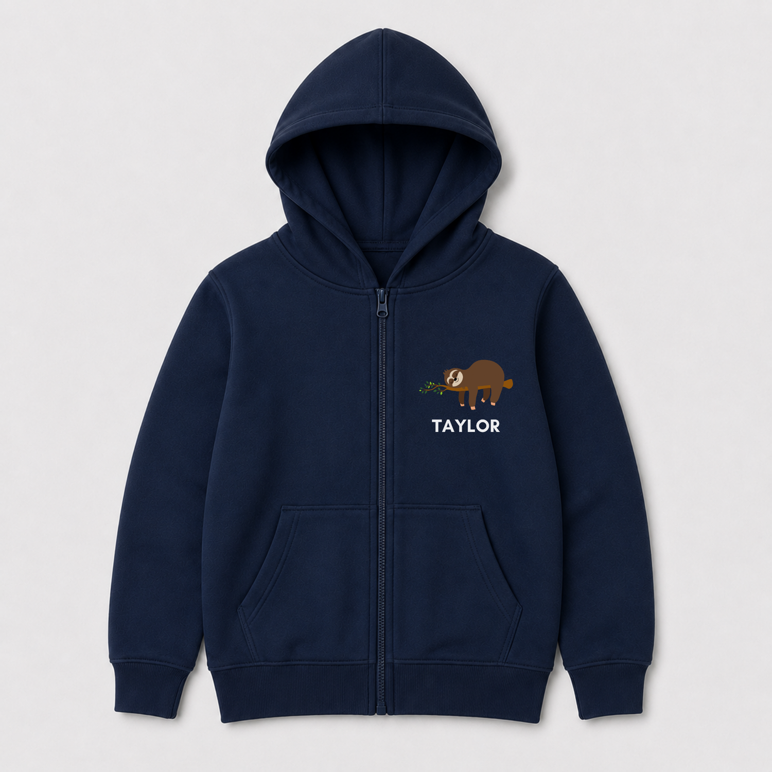 Navy kids personalised zip hoodie with a brown sloth sleeping over a small leafy branch and Taylor printed beneath the design.