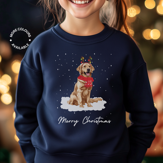 A child wearing a navy Christmas jumper with a festive golden retriever design and the text 'Merry Christmas' on the front.