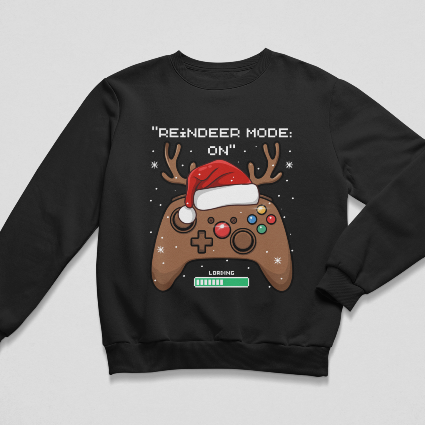Black kids Christmas jumper featuring a festive reindeer gaming controller and Reindeer Mode On slogan.