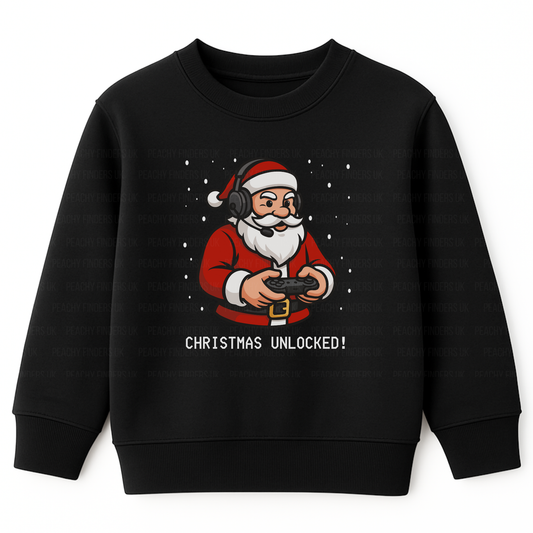 Kids black Christmas sweatshirt with a cartoon Santa holding a gaming controller and the slogan "Christmas Unlocked!" – perfect for kids who love video games
