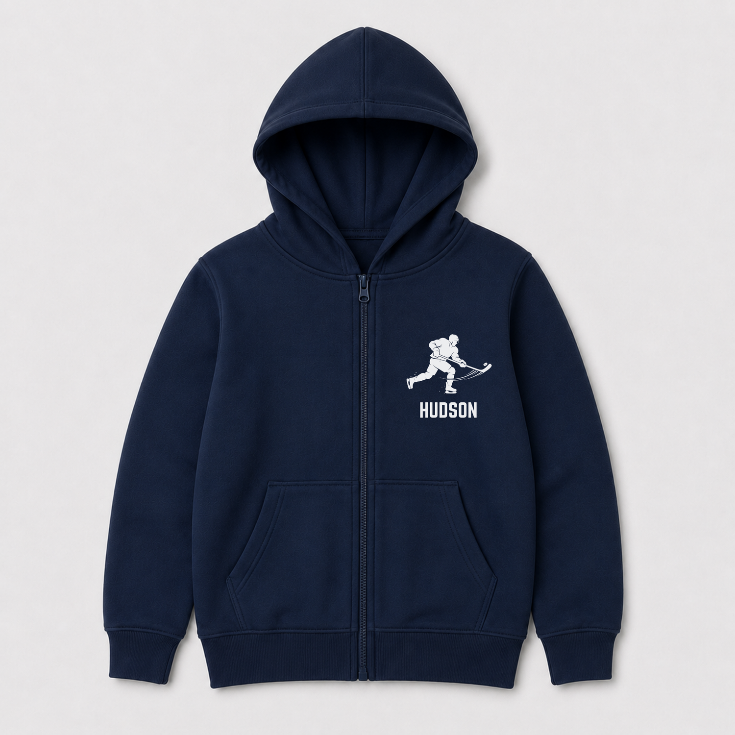 Navy kids zip-up hoodie with a white hockey player graphic with custom name underneath. 