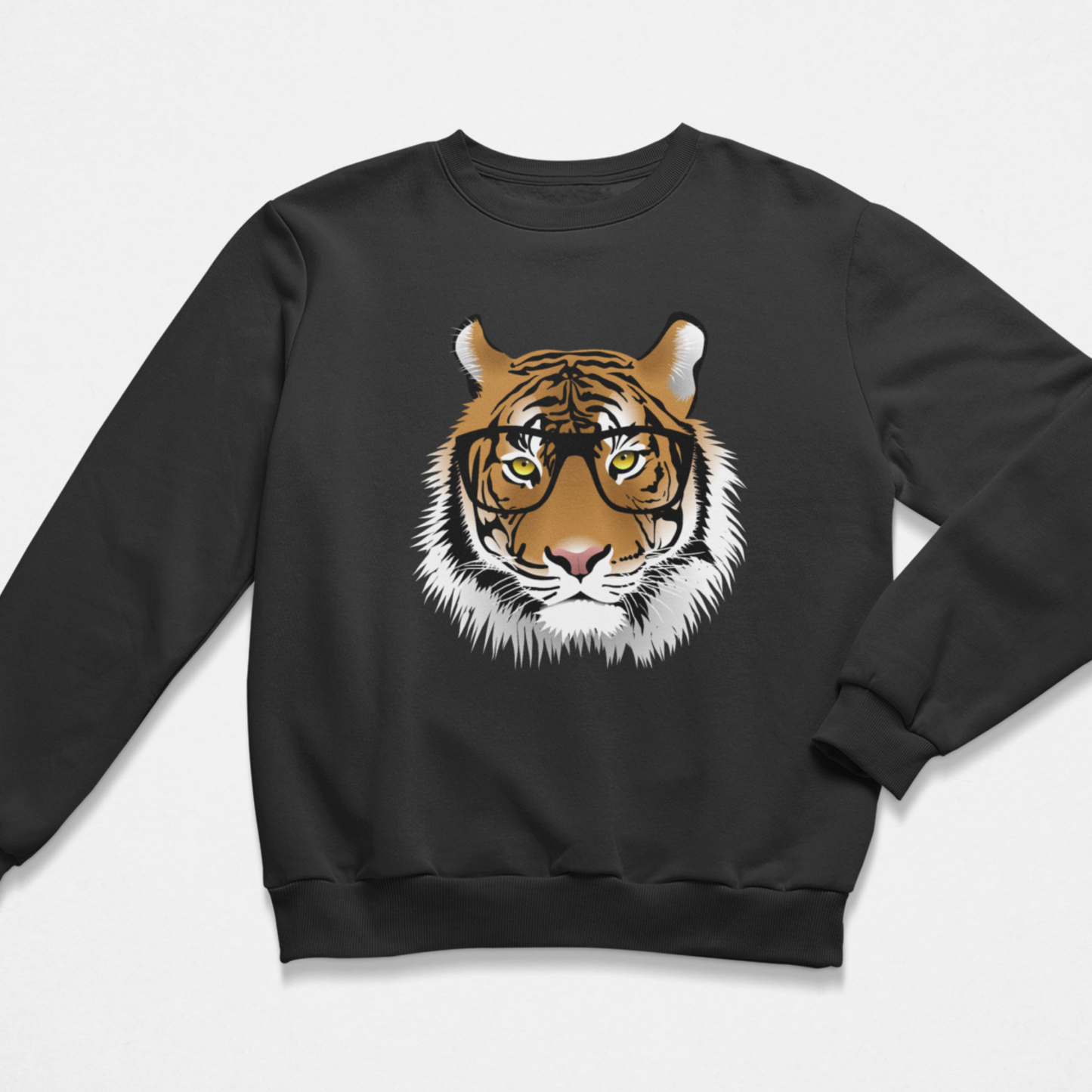 A kids black crewneck sweatshirt featuring a graphic print of a tiger's face wearing round black glasses, displayed on a light grey background.