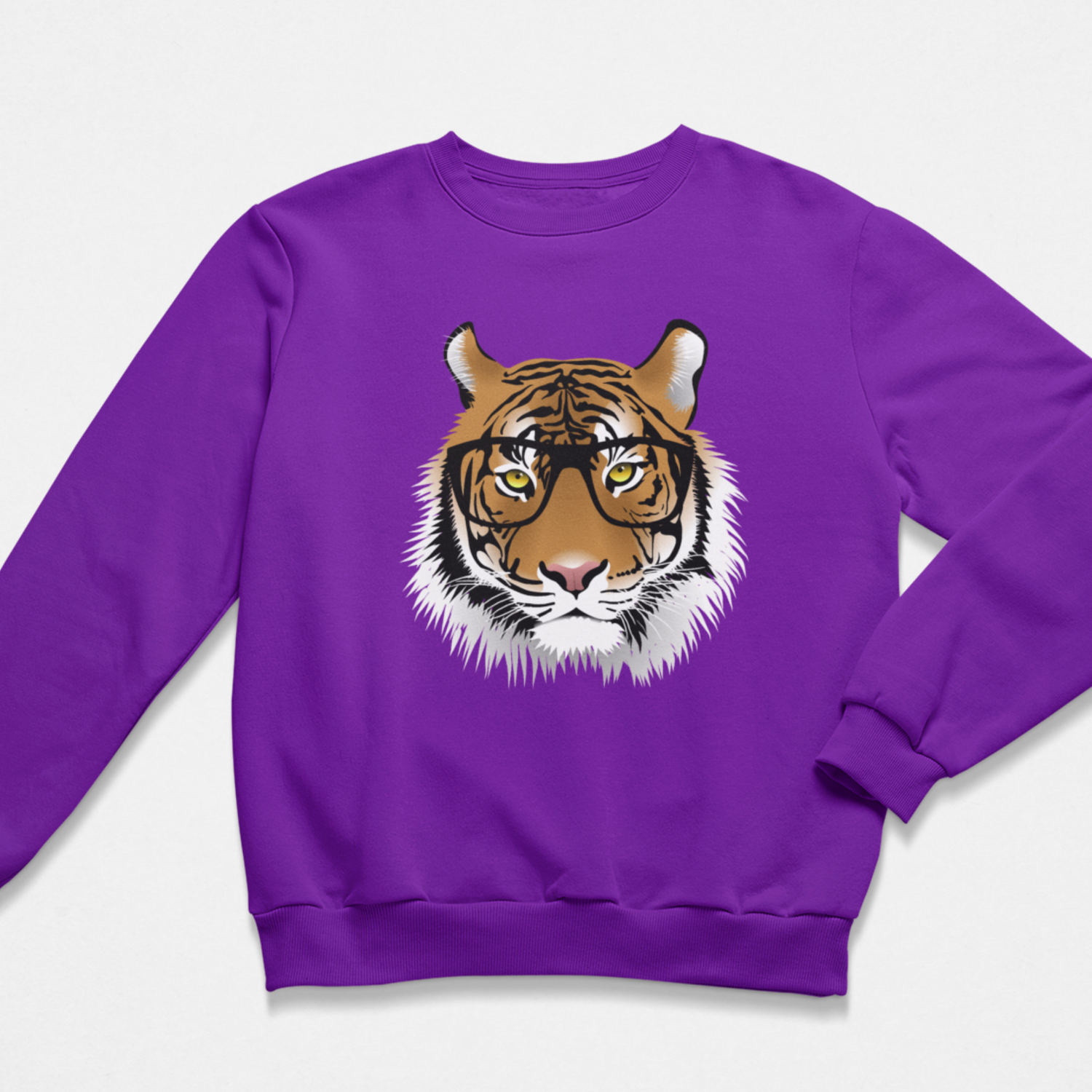 A kids purple crewneck sweatshirt featuring a graphic print of a tiger's face wearing black-rimmed glasses on the front, displayed against a light grey background.