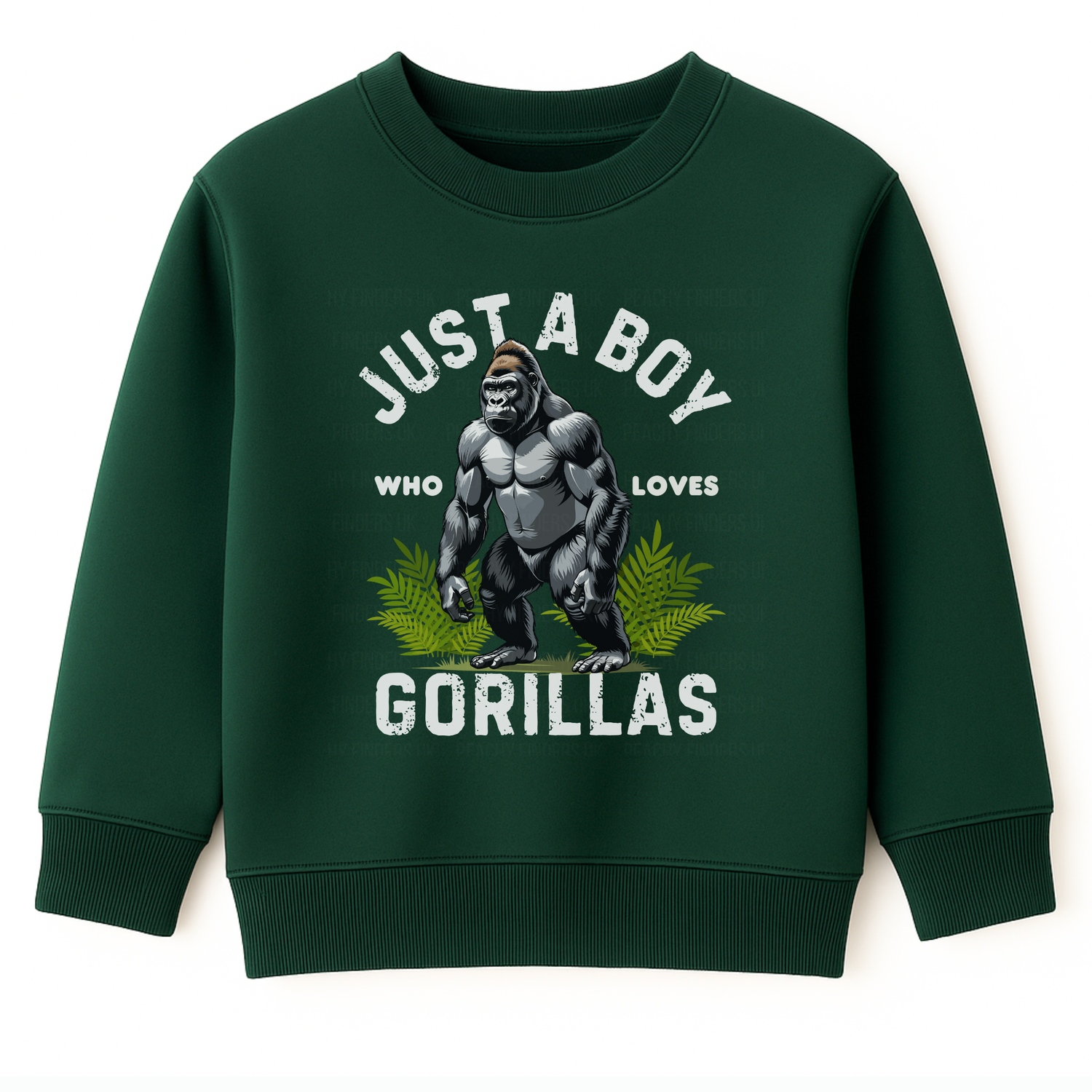 Kids dark green sweatshirt with “Just a Boy Who Loves Gorillas” text and gorilla graphic over green leaves, flat lay on white background.