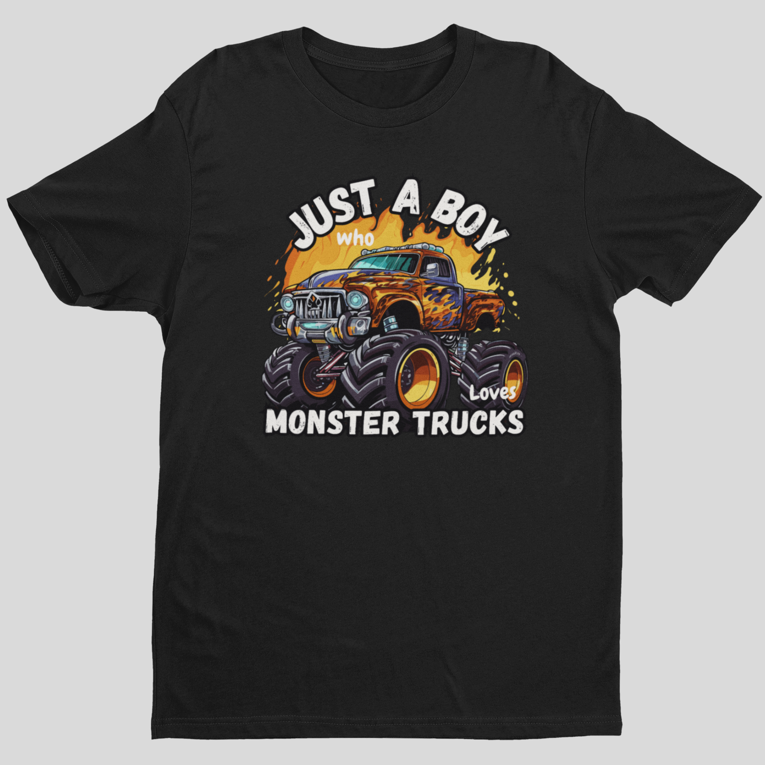 Boys black cotton T-shirt with the text 'JUST A BOY who loves Monster Trucks'  and fierce looking truck printed on the front.