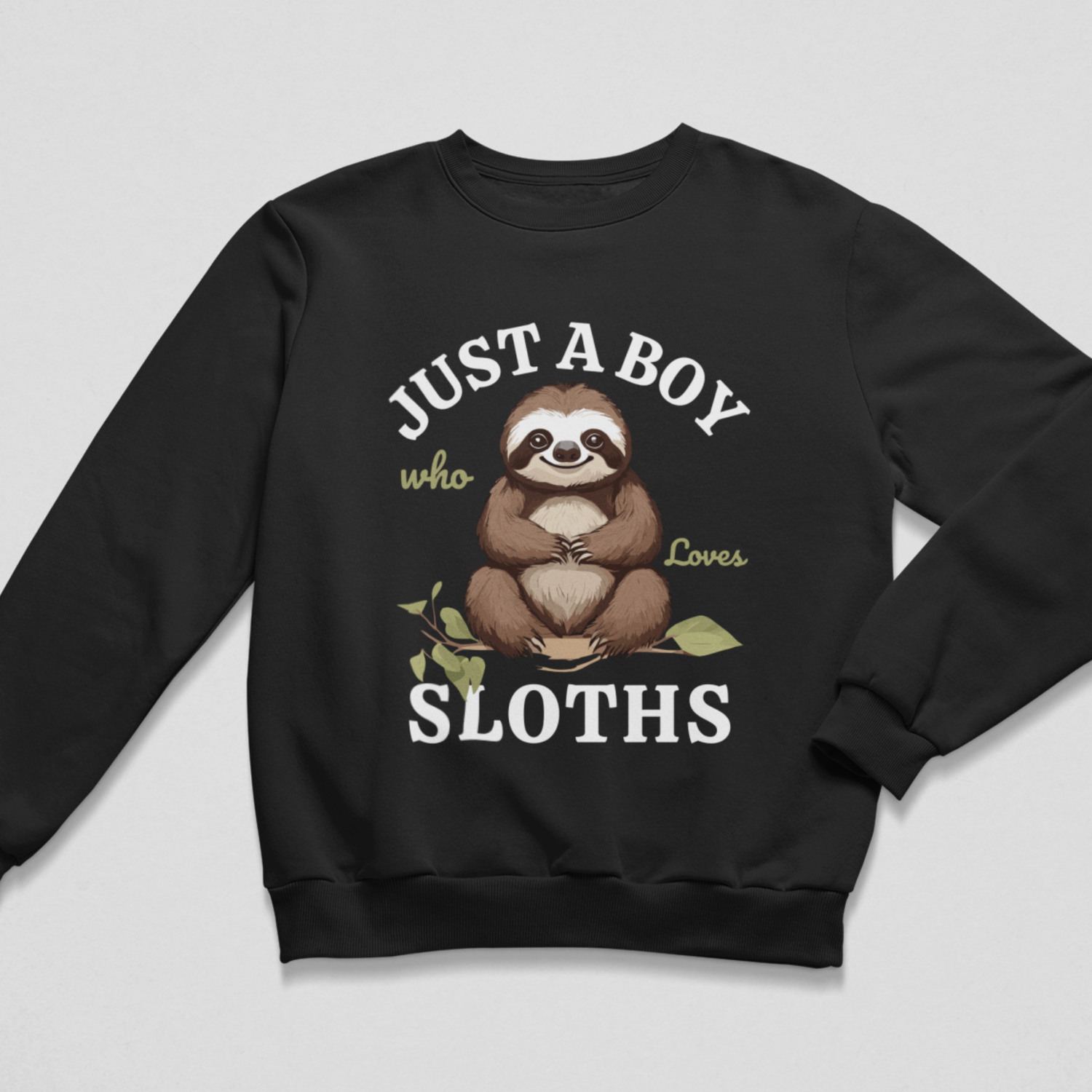 Black crewneck boys’ sweatshirt featuring a smiling sloth sitting on a leafy branch with “Just a Boy Who Loves Sloths” lettering.