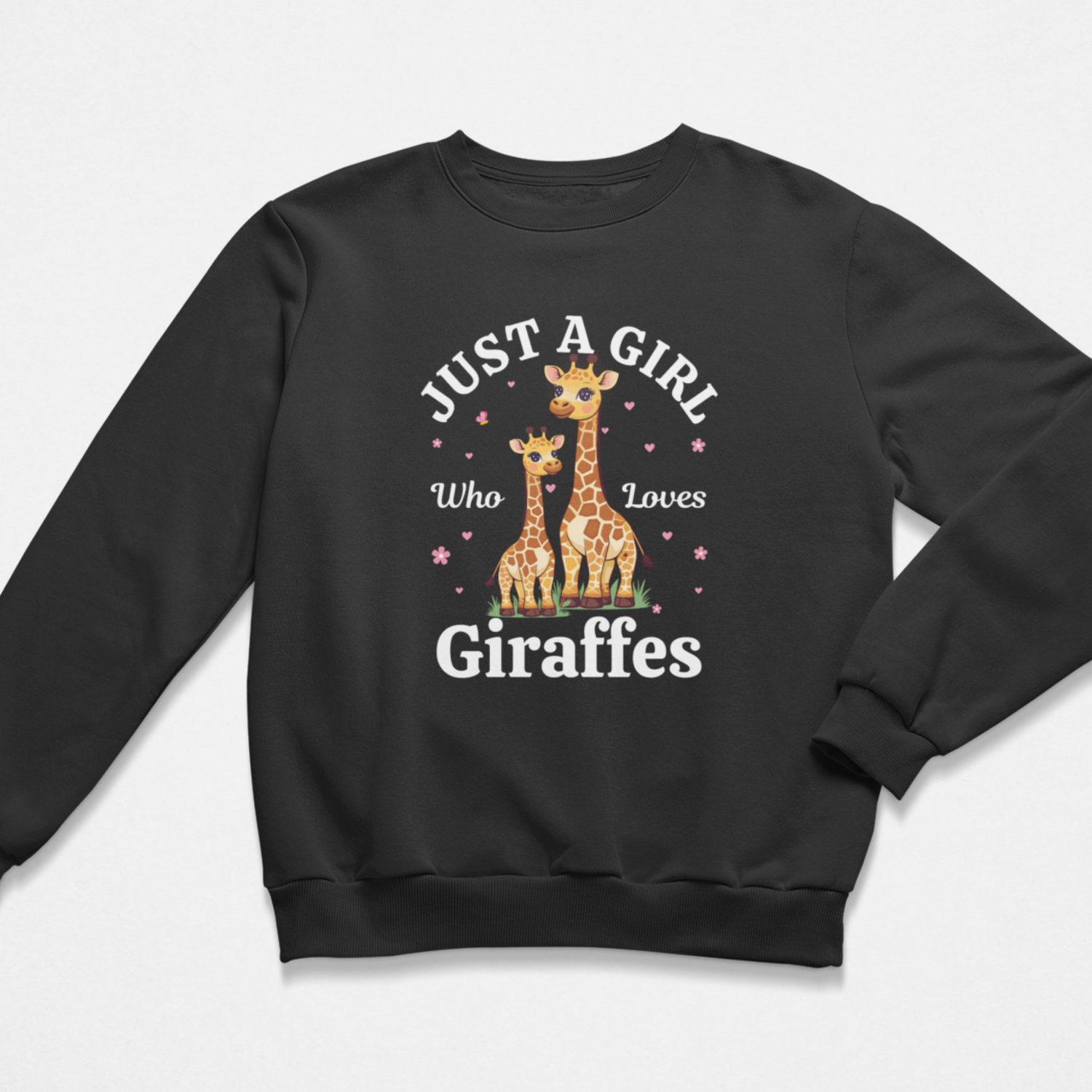Girls black sweatshirt featuring a giraffe design with "Just a girl who loves giraffes" text in white along with scattered hearts and flowers.