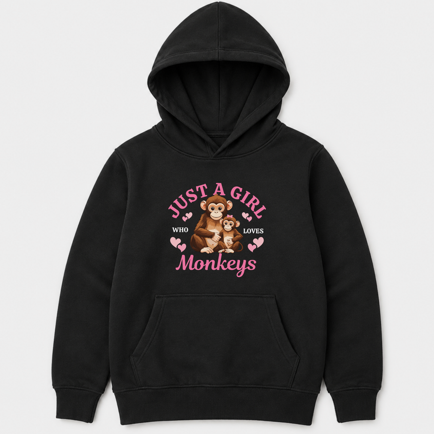 A kids black pullover hoodie with a front graphic that reads 'JUST A GIRL WHO LOVES Monkeys' in pink, featuring an illustration of a monkey holding a teddy bear, on a light grey background.
