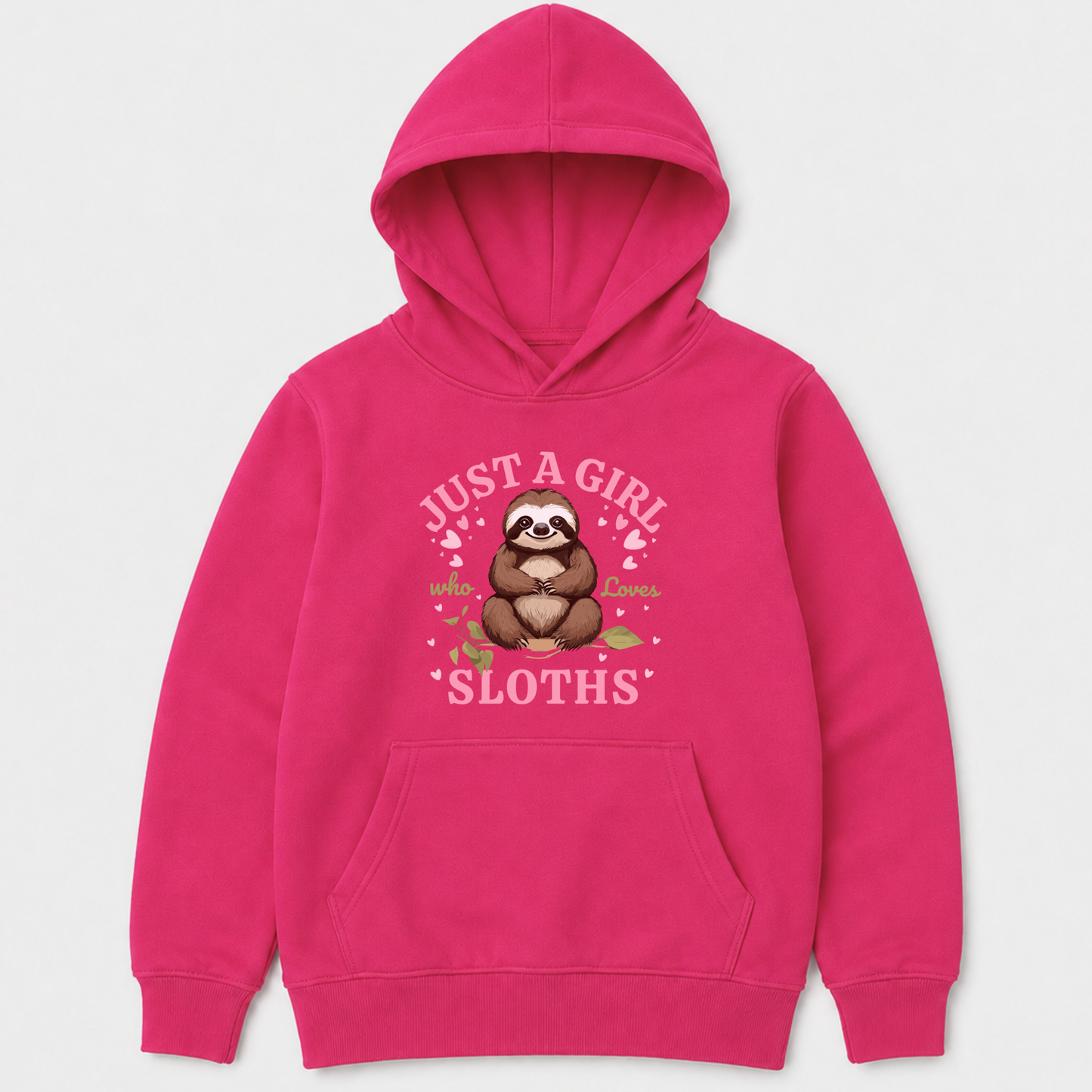 A bright pink kids pullover hoodie with a front kangaroo pocket and a graphic of a sloth sitting in the center, surrounded by the text 'JUST A GIRL SLOTHS' in white, with small pink hearts and green leaves.