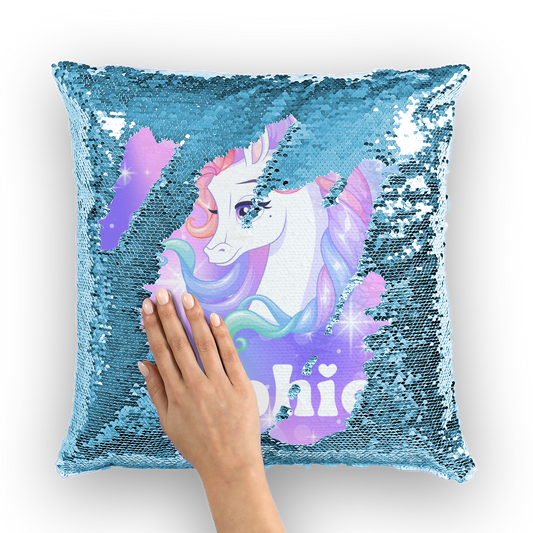 Light blue reversible sequin cushion revealing a personalised unicorn design with a child’s name. Ideal decorative pillow for kids bedrooms or gifts.